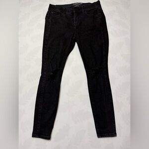 Torrid Black Skinny Jeans with Distressed Knees